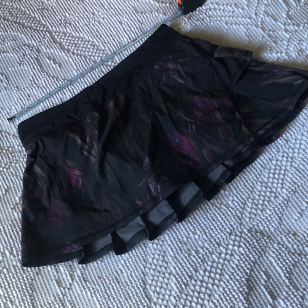 Like new black, floral Lululemon ruffled tennis skirt.